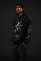 Male model wearing No Compass Still Moving Premium Logo Hoodie