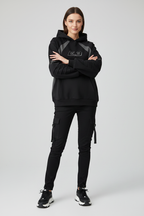 Female model wearing Premium Logo Hoodie
